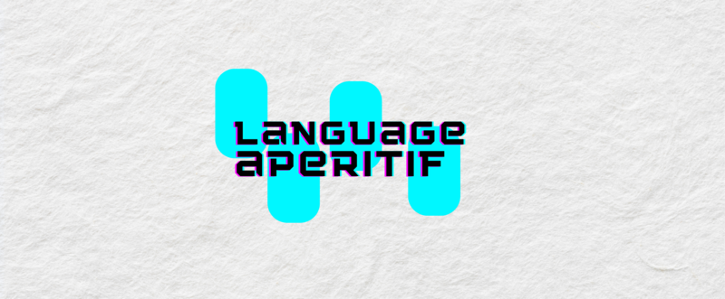 La scritta "language aperitive" sullo sfondo di carta stropicciata