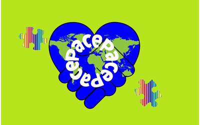 disegno di due mani che si stringono e formano il globo terreste a forma di cuore, sopra c'è la scritta pace