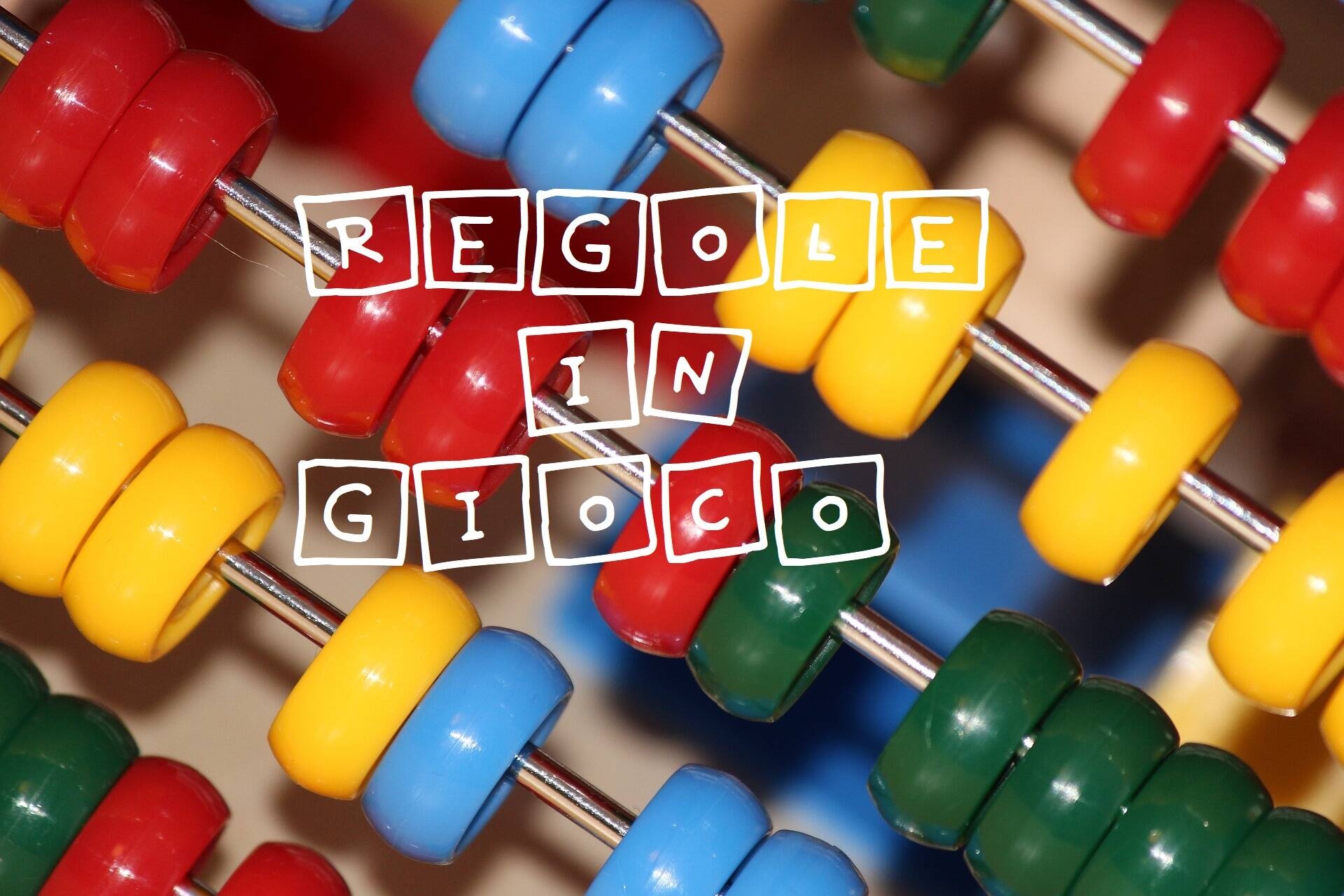 dettaglio di un pallottoliere con sovrapposta la scritta regole in gioco