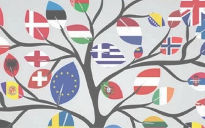 Bandiere europee sui rami di un albero